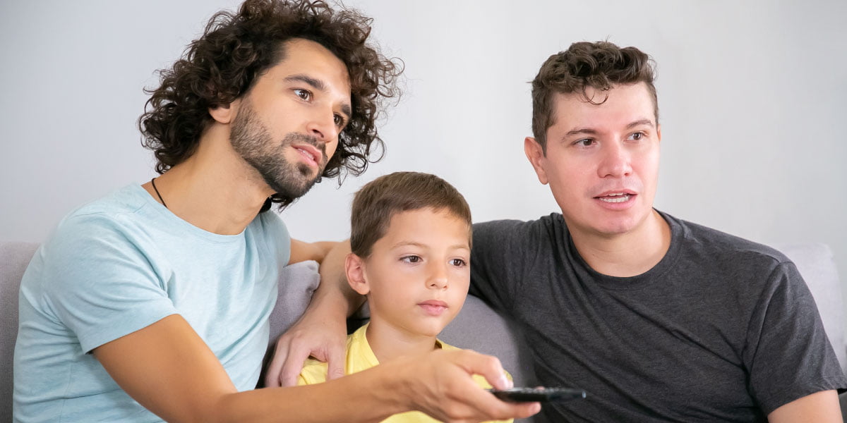 Two older brothers and a younger one watching TV with Zgemma