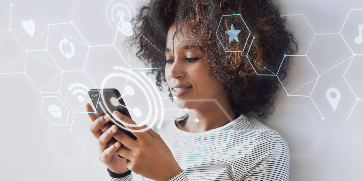 Teenage girl using her phone which is connected to Sky WiFi