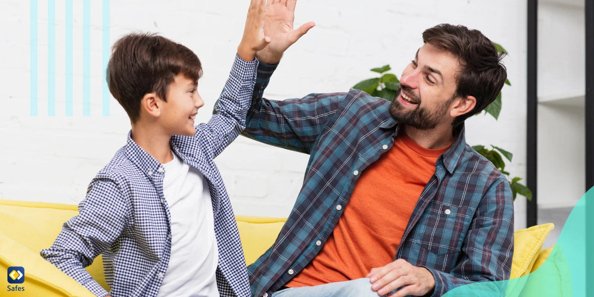 Father and son hi five because they’re successful in digital minimalism