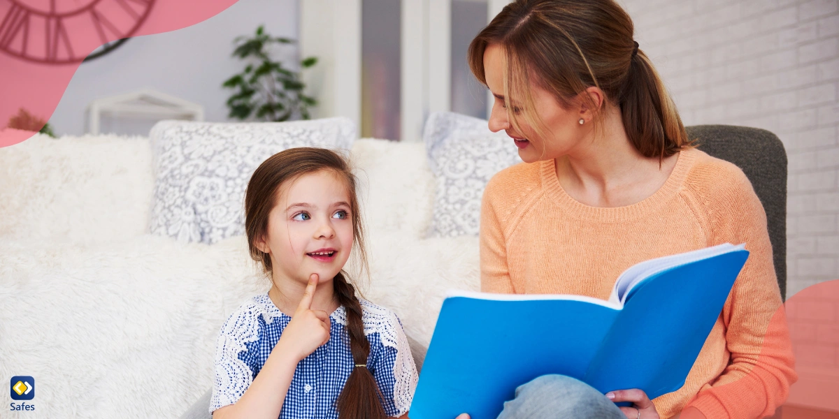 Mom educating daughter with a book