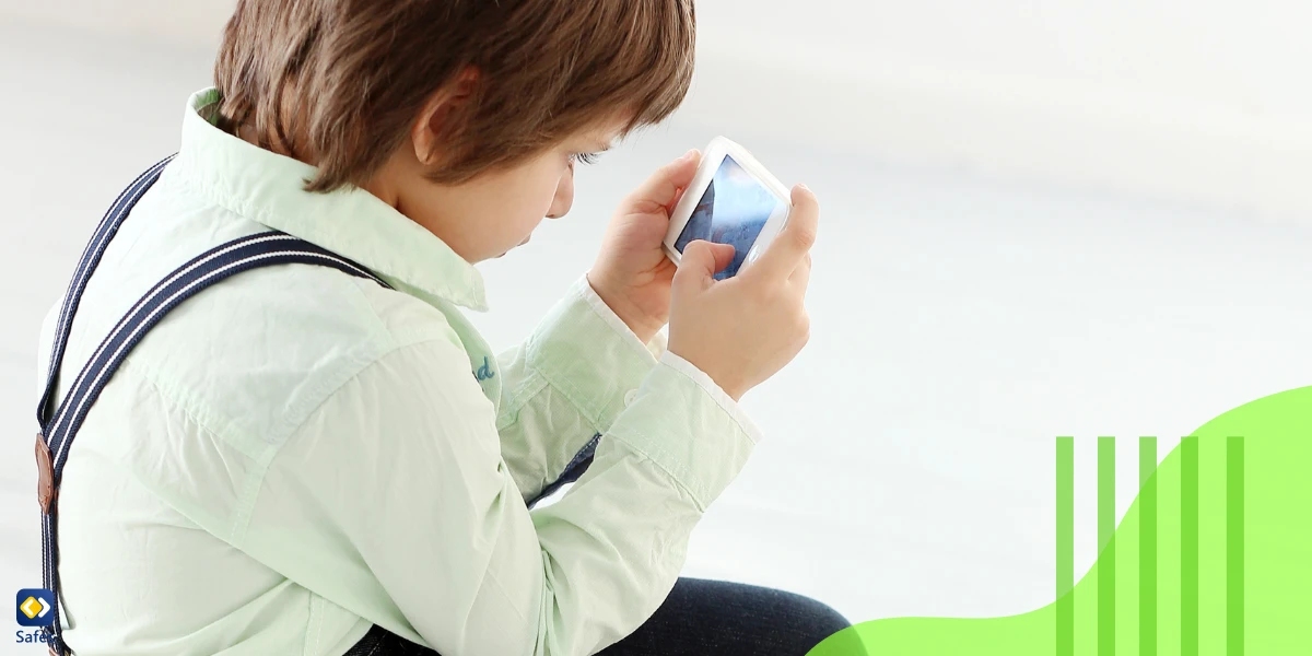 Child slouching while using phone