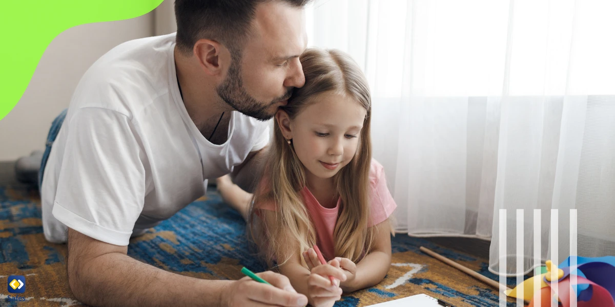 Father helping his daughter with her tasks