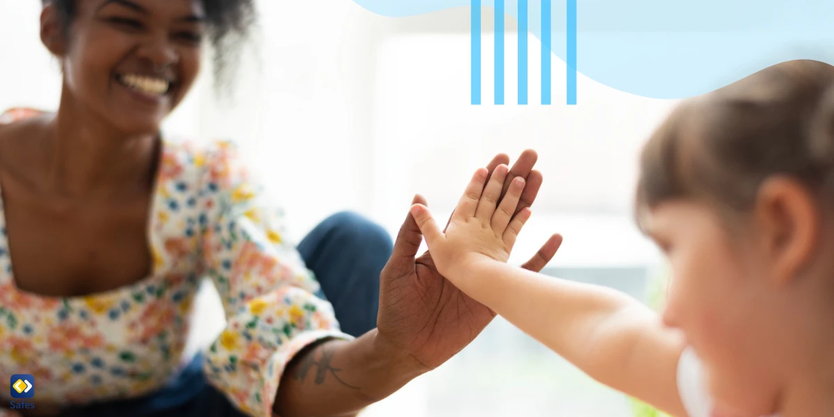 Supportive mom and daughter doing a high five