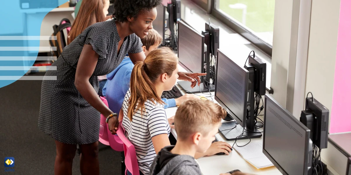 Students using computers at school in a digitally safe environment