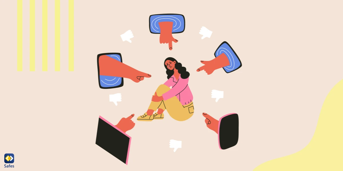 An illustration showing fingers pointing out of multiple phone screens at a teenage girl in the middle crying