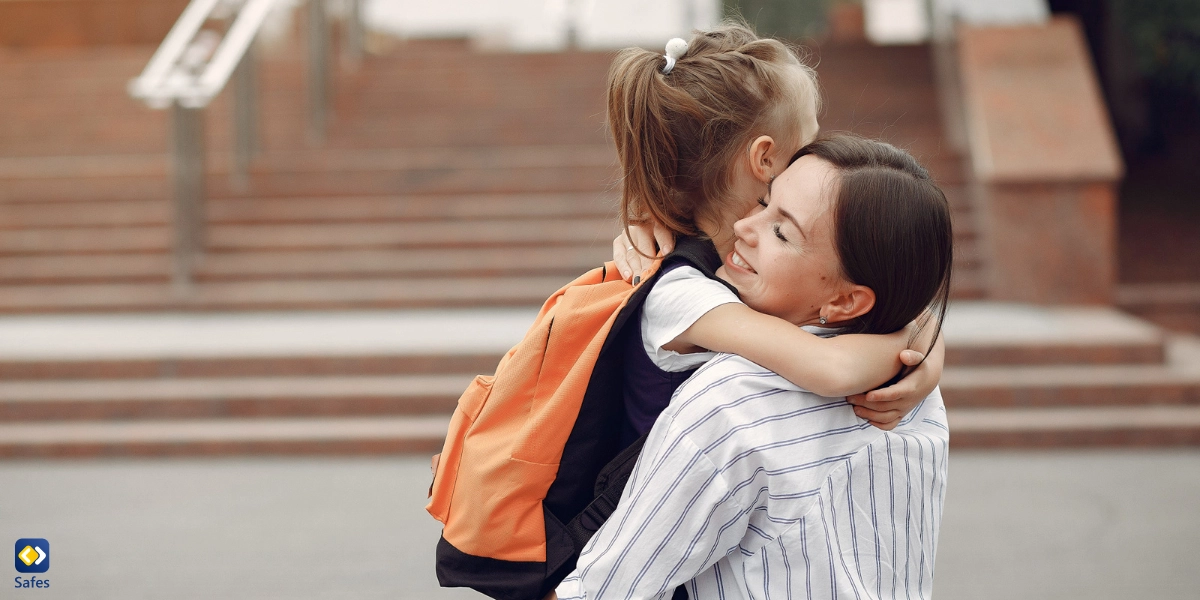 Child Kissing Her Mother Goodbye Going Off to School