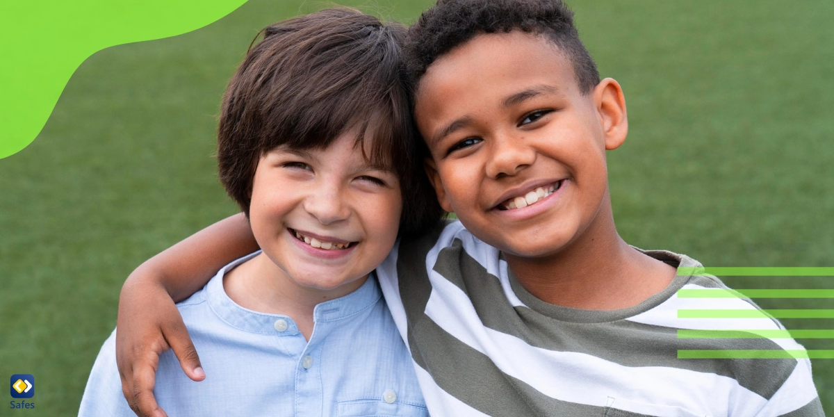 A biracial child and his friend hugging and smiling