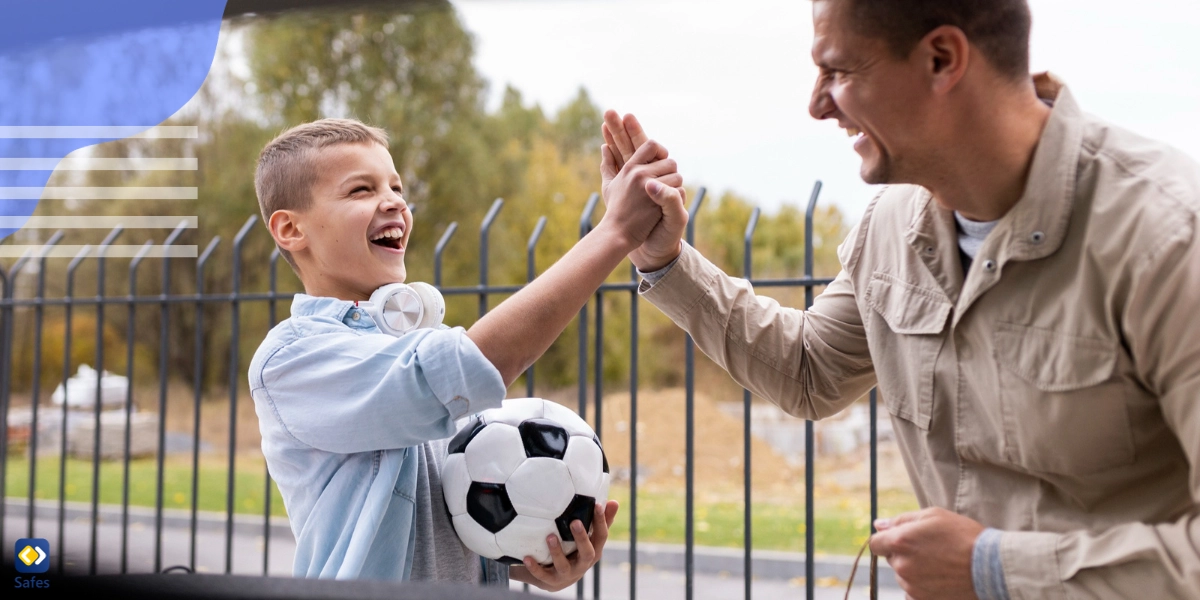 Father has provided a football as a birthday gift to his teenage son