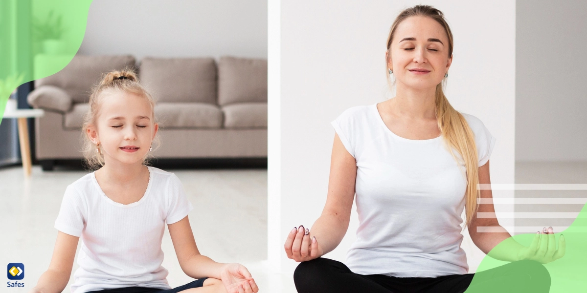 Mother and daughter meditating