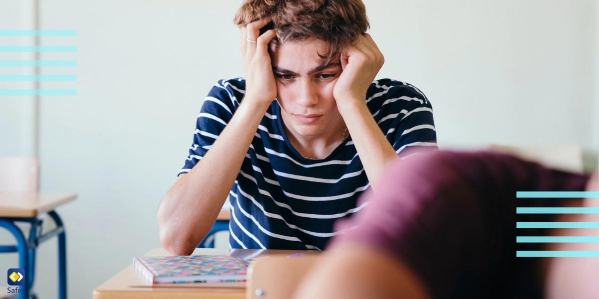 Troubled teen sitting in class