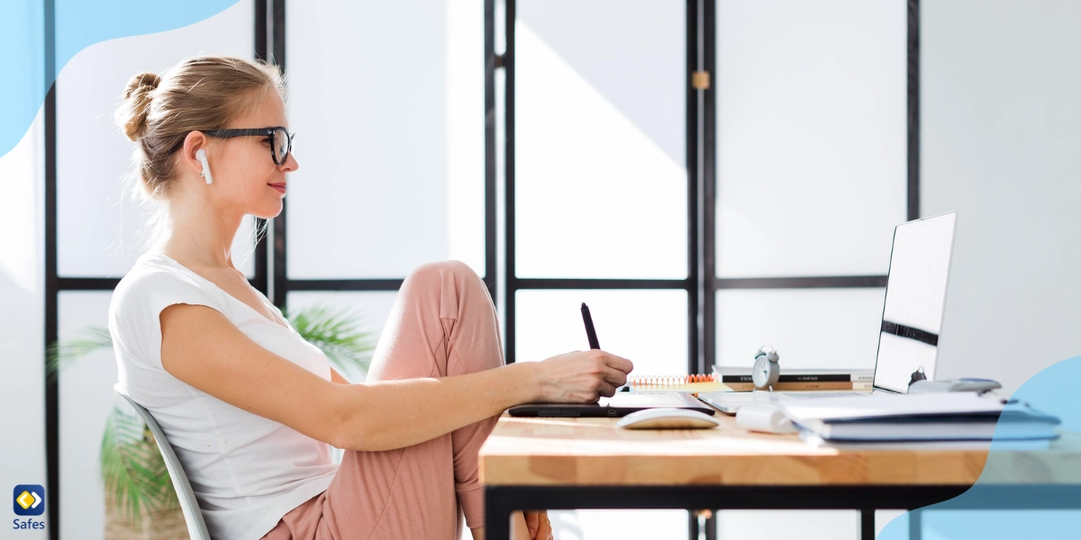 A student sits improperly at her desk because she doesn't have access to an ergonomic study station.