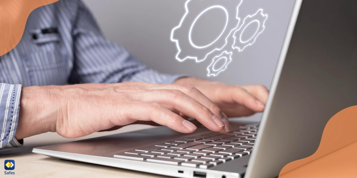 A close-up of a father's hands while installing educational apps on his child’s computer