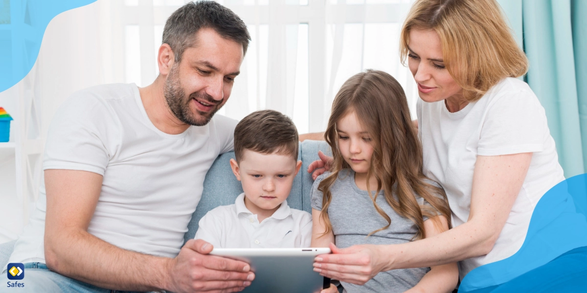 Parents talking to their children about the risks and dangers of internet, while the children are looking at their tablet