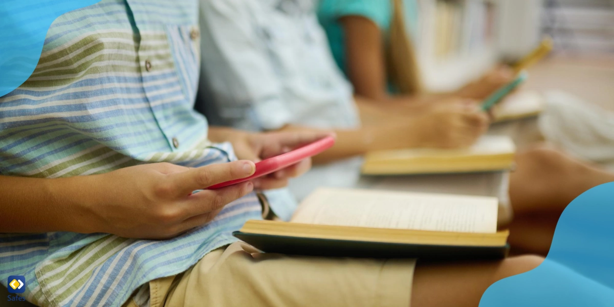 Some students distracted by their phones in class and secretly checking them