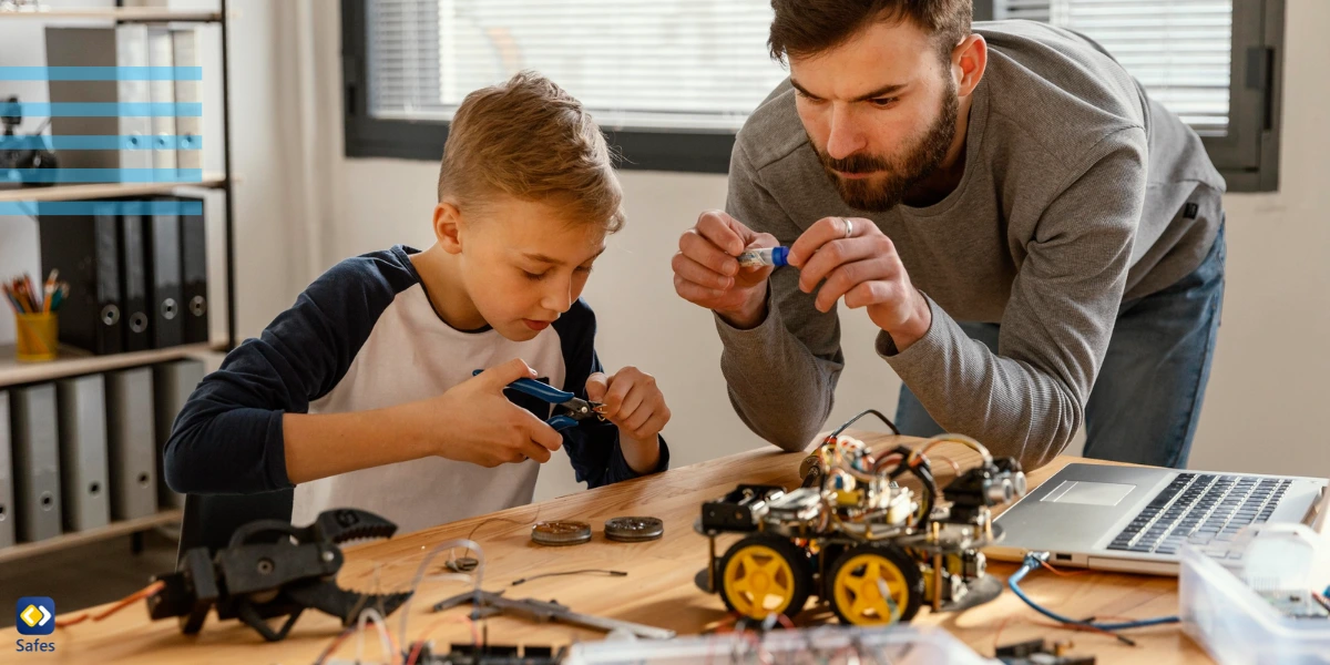 Father building a robotic toy for his kid