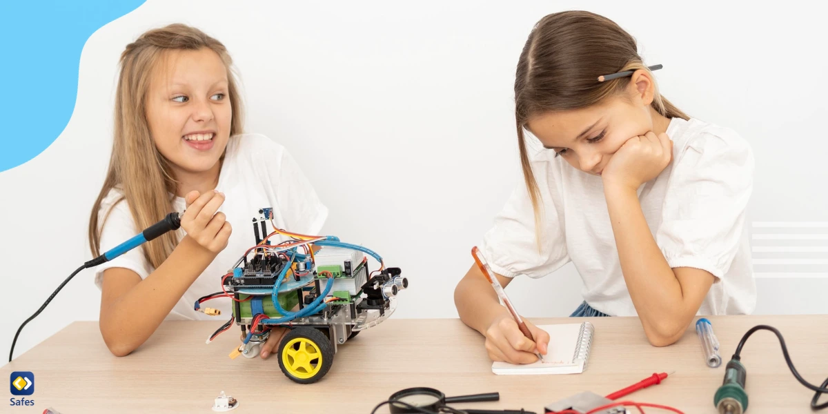 Children practicing building a robot