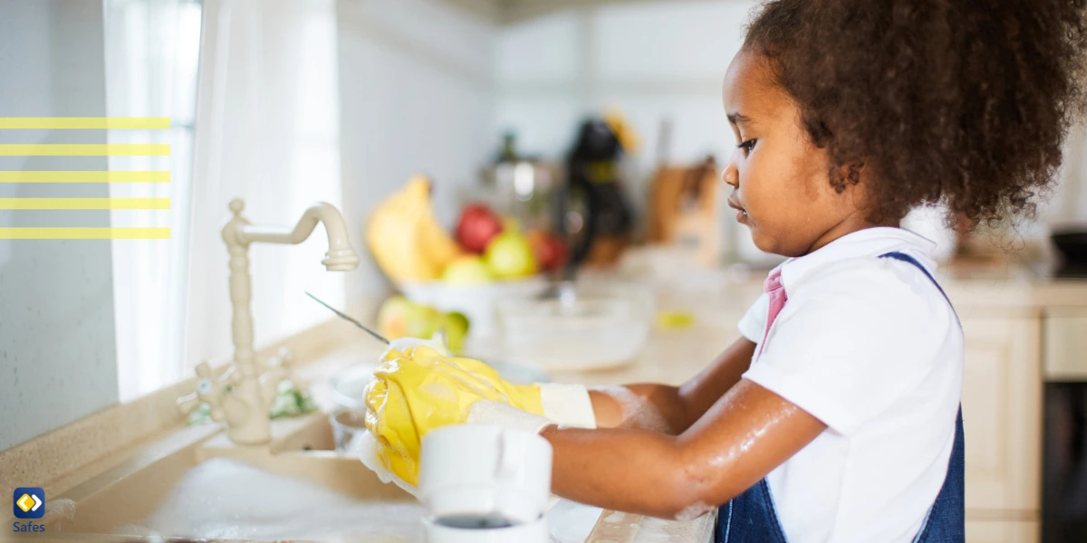 Child cleaning dishes