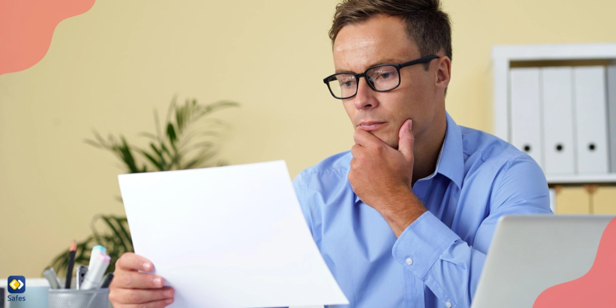 A father rereading his complaint form to ensure that he has given an accurate and unbiased description of the problem.