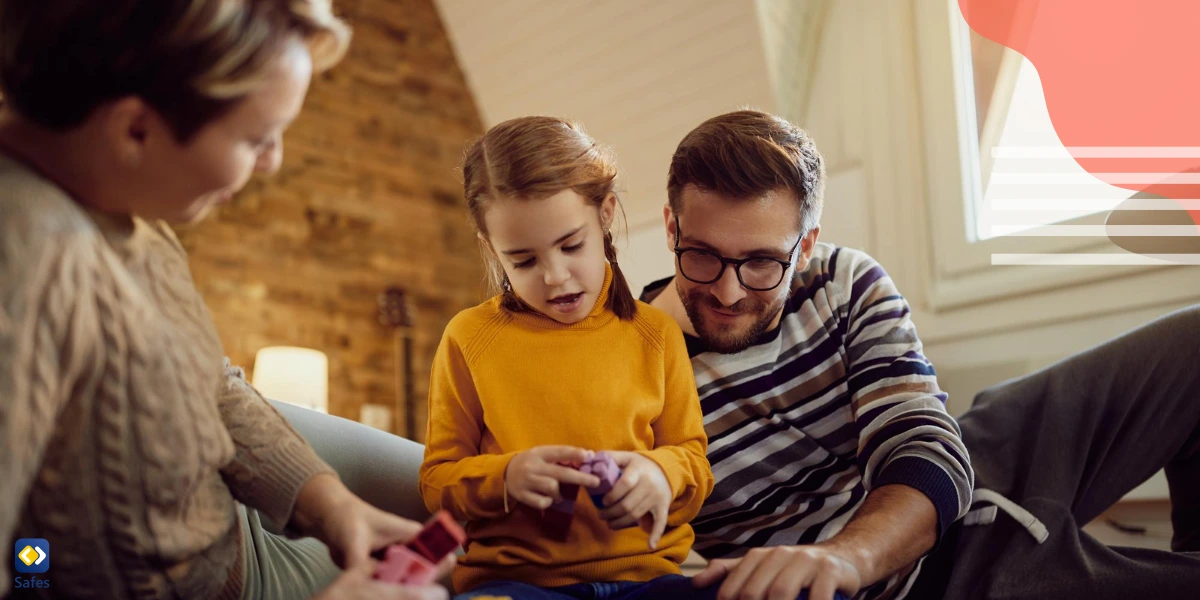 A mother and father allocating special time to play with their child at home