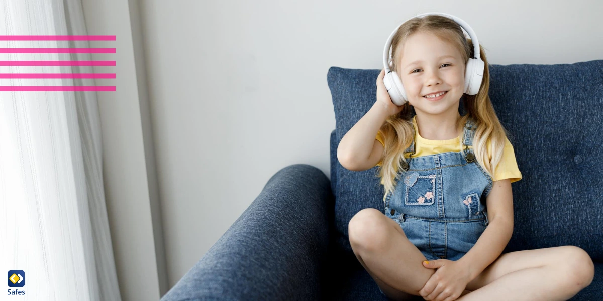 A girl listening to and enjoying an educational podcast.