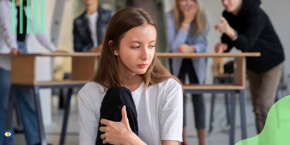 Girl being bullied in high school by classmates