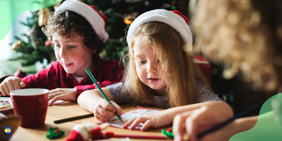 Children making Christmas cards for their friends and family