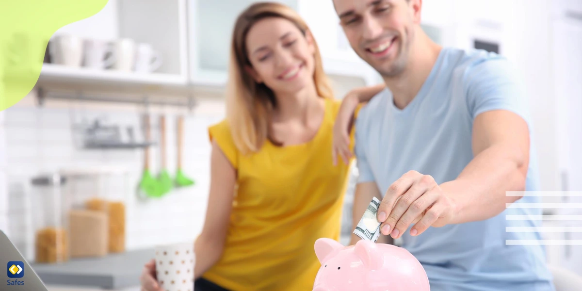 A young couple happily saving for the future of their child.