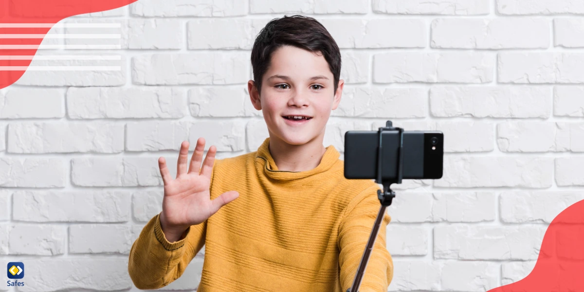 Child taking a video selfie of himself for YouTube