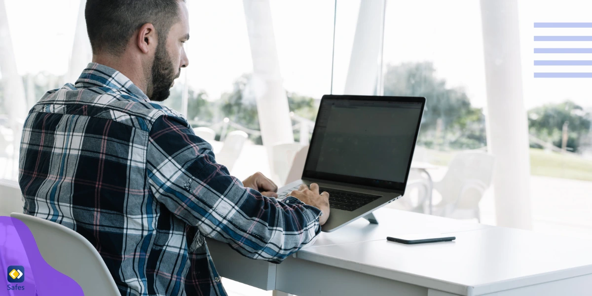 A Zigazoo human moderator behind a laptop, vetting videos submitted to the platform.