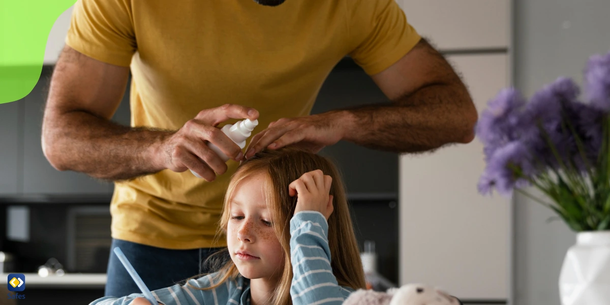 An involved father taking care of her daughter while she’s doing her homework.