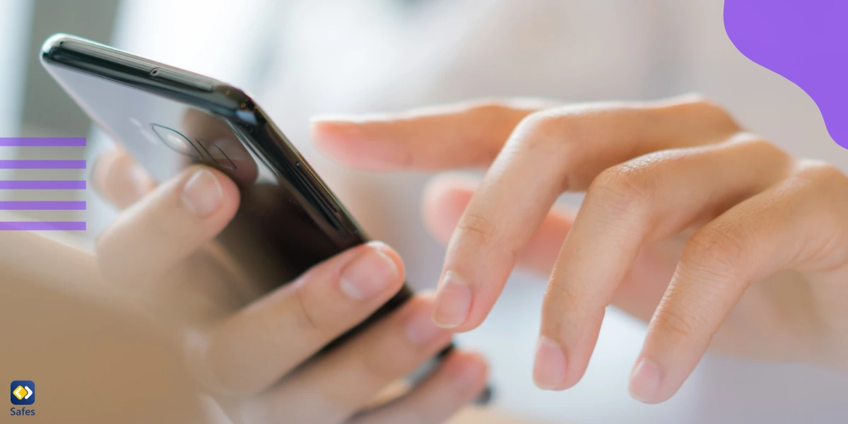 A teenage girl using Wizz on her phone to swipe through profiles.