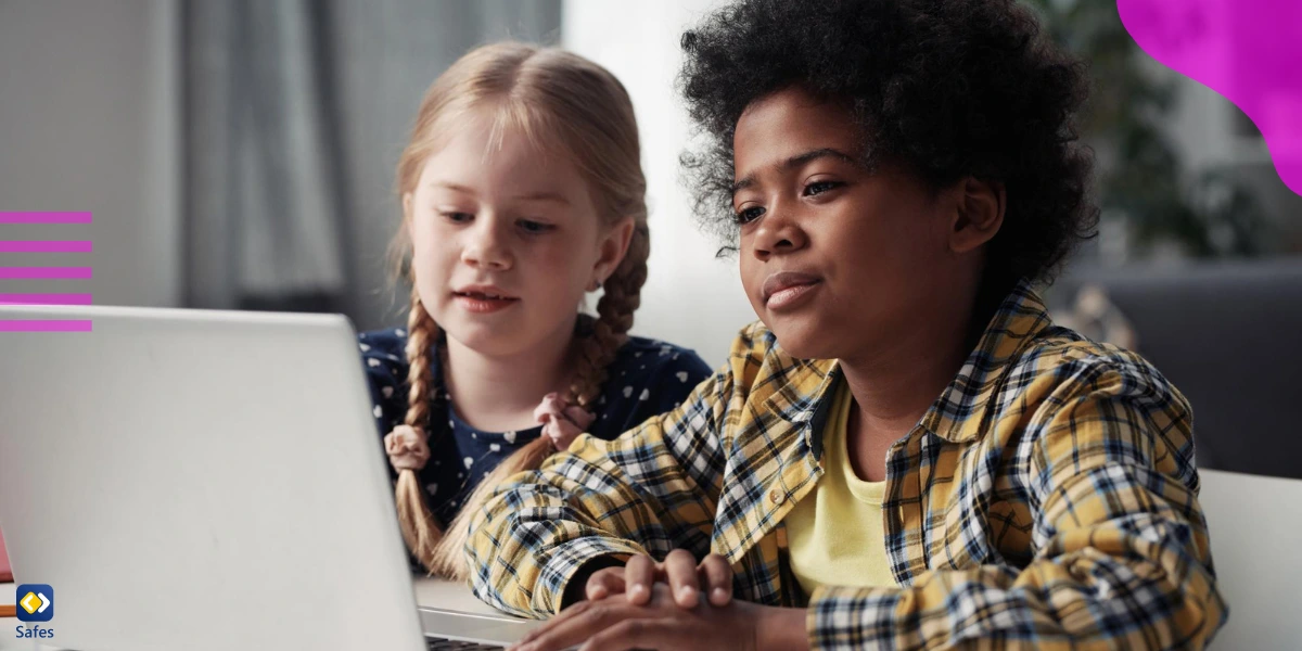 Children equipped with tech-savvy skills using a laptop to learn about technology