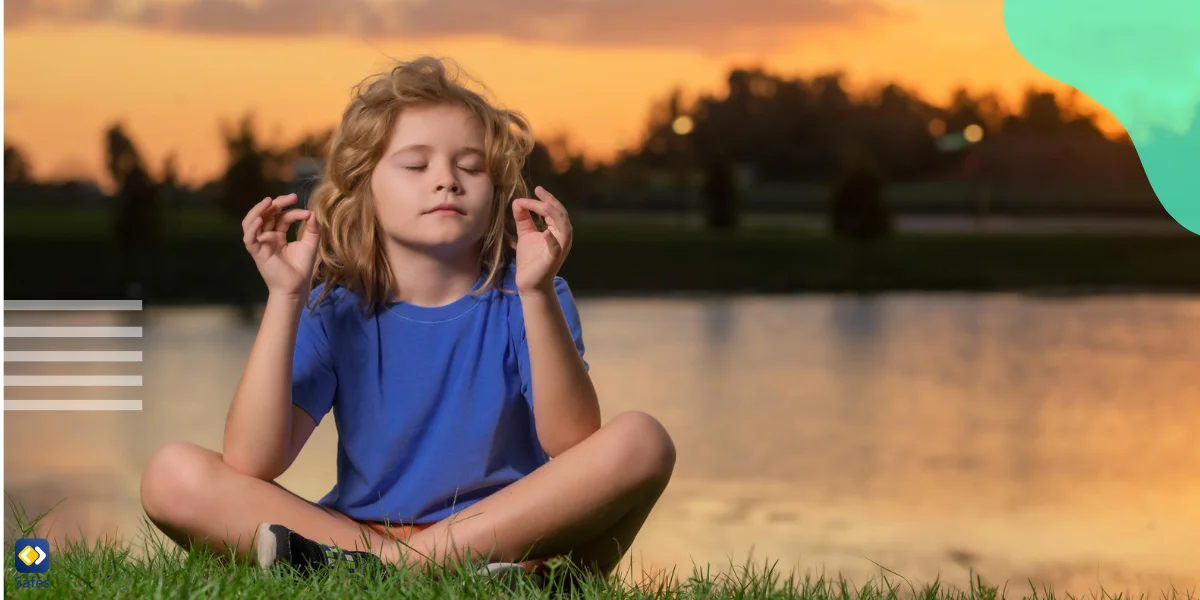 a young kid practicing mindfulness by meditating in nature