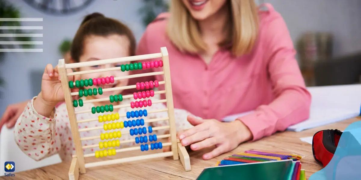 a mother helping her daughter with dyscalculia learn math using colorful objects