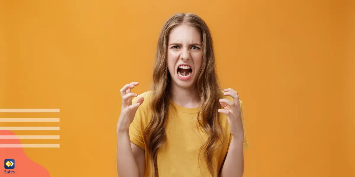 a teen girl suffering from tantrums and yelling angrily while clenching hands into fists