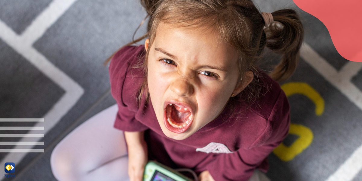 a young girl with ADHD is playing a game and showing impulse behaviors