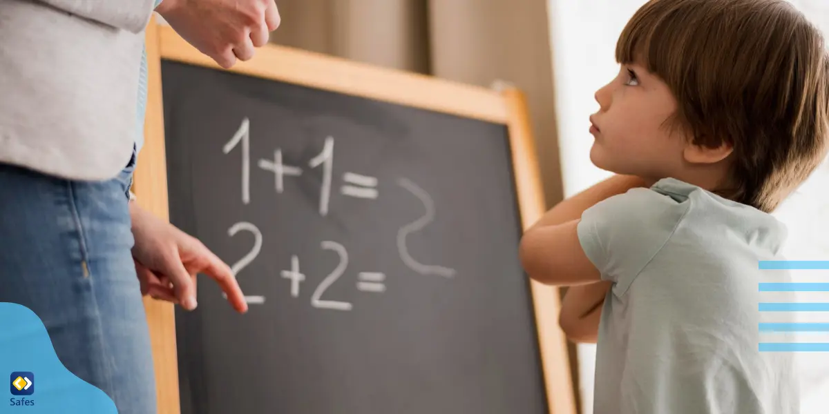 a young boy suffering from dyscalculia standing next to a blackboard with his parent and having difficulty doing basic math operations.