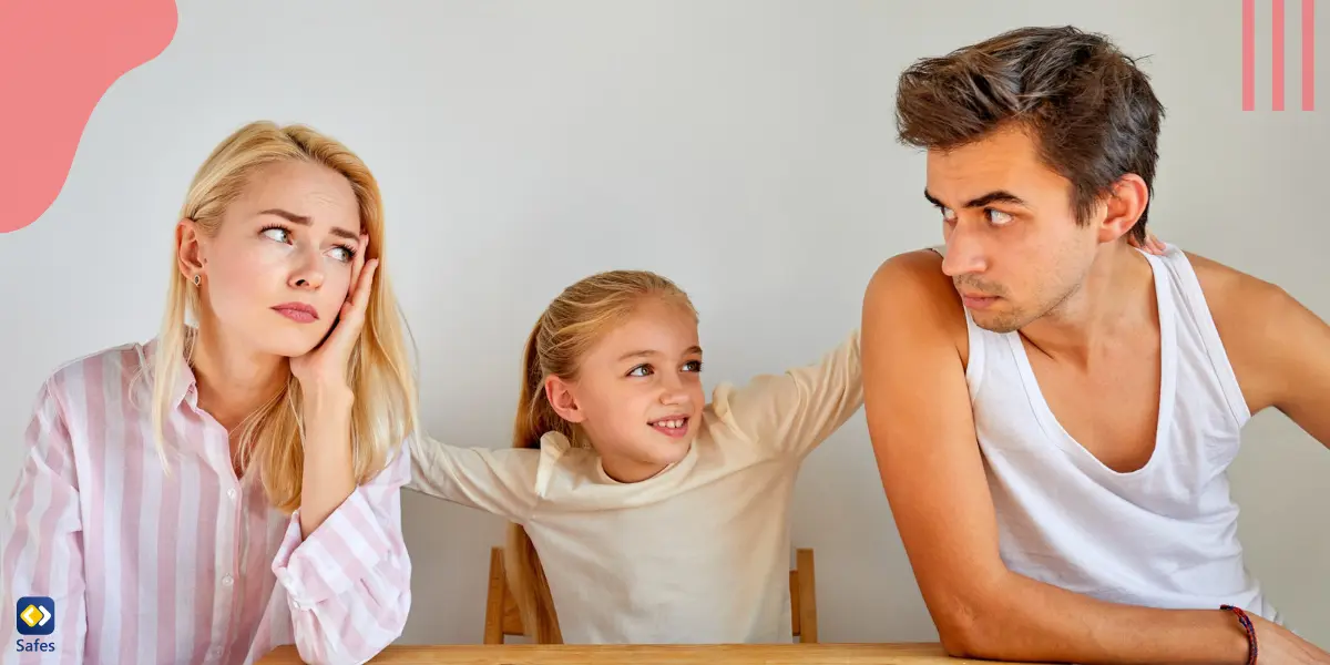 Family sitting at the table and the daughter is trying to reconcile her parents who had quarrel