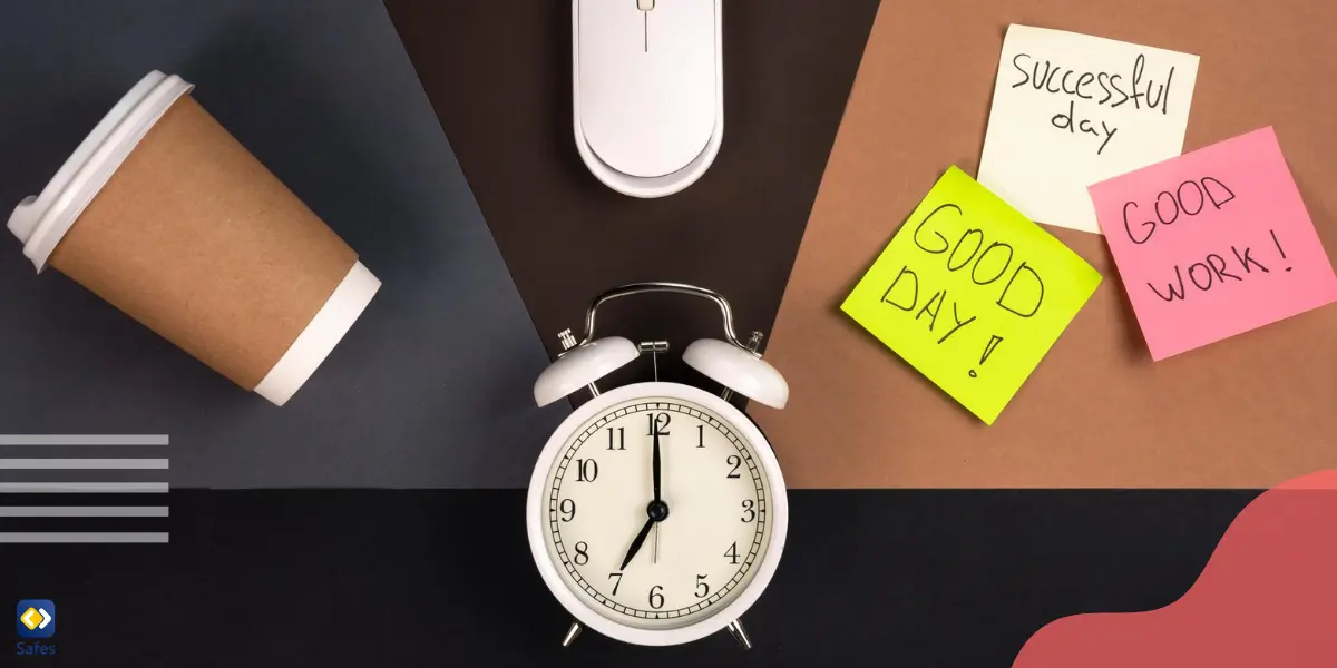 A top-down view of an alarm clock, computer mouse, paper cup, and bright paper stickers arranged in a way that creates a visually appealing and organized aesthetic.