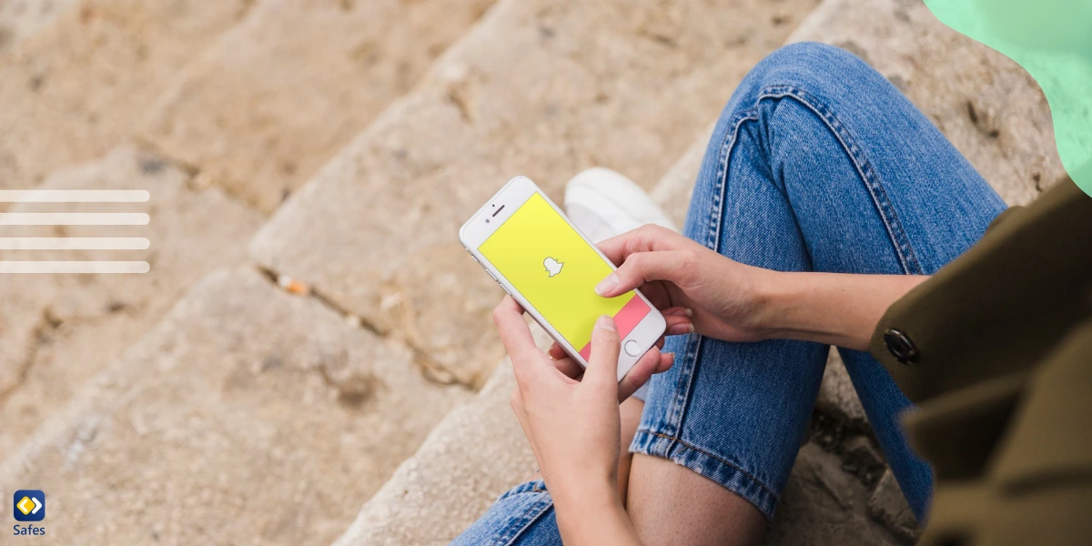 a girl sitting on a staircase using Snapchat on her smartphone