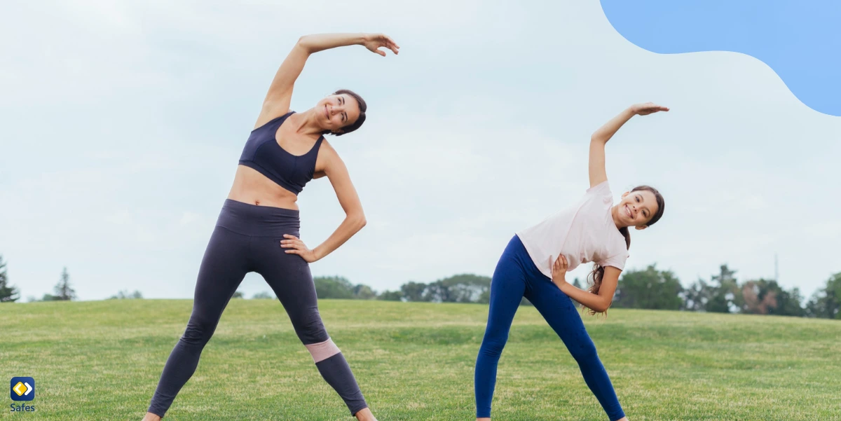 Mother and daughter exercising together as a family activity