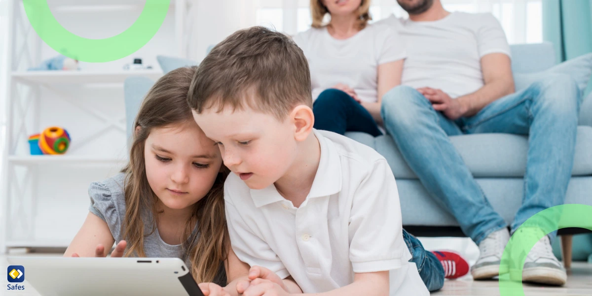 Parents supervising their children using their tablet.