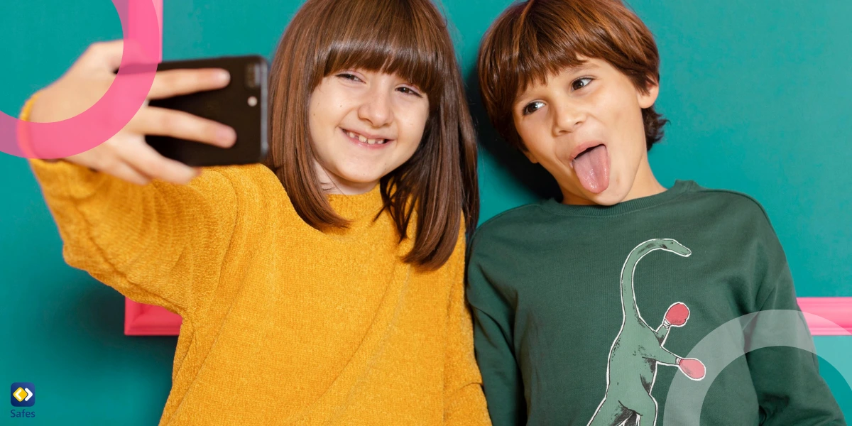 a young girl and boy are taking a selfie with a phone and showing funny faces.