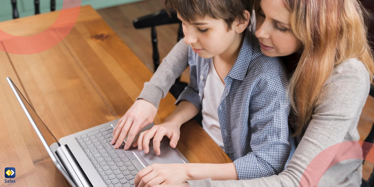 Mother teaching her son how to protect his information online using a laptop