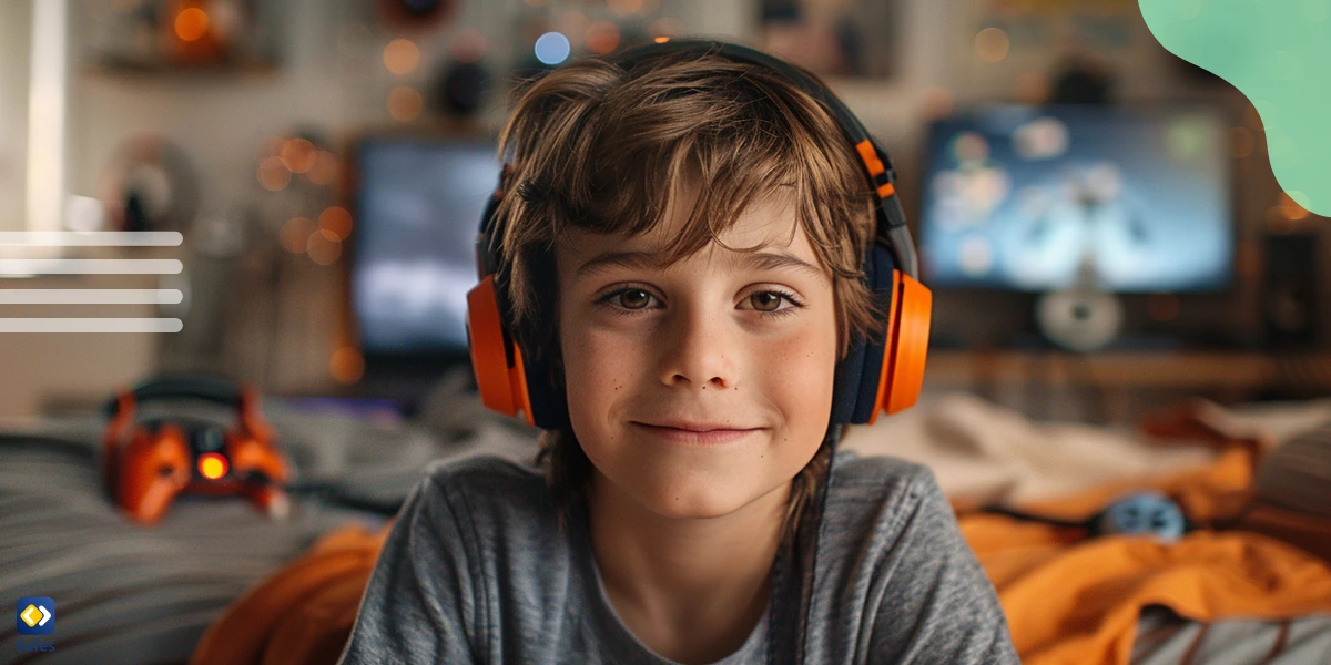 A boy wearing headphones with a smile on his face