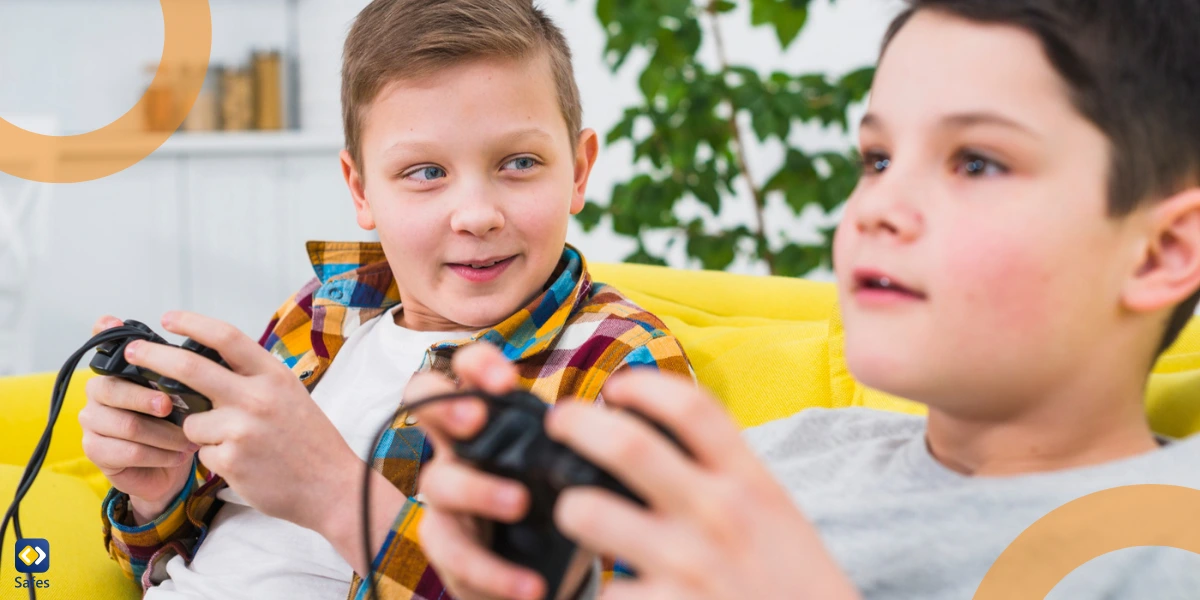 Young boys playing video games together