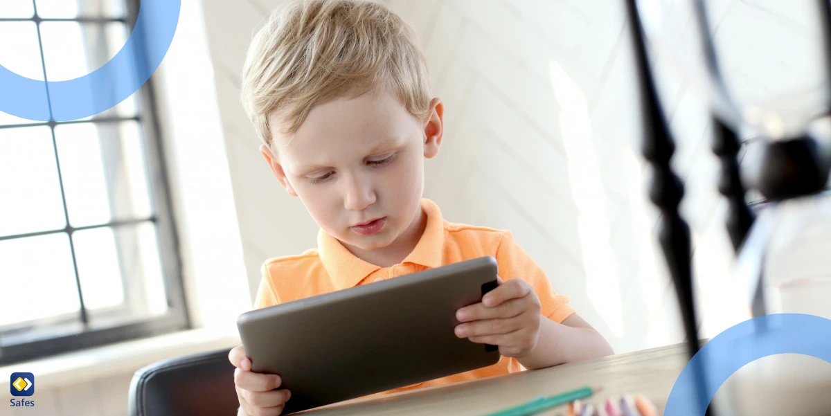 a young girl is using a tablet at home