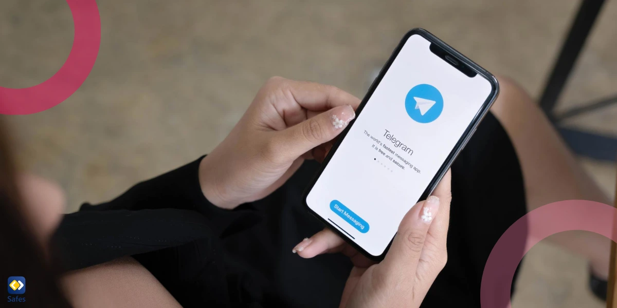 Woman using a phone with the Telegram application setting up on the screen