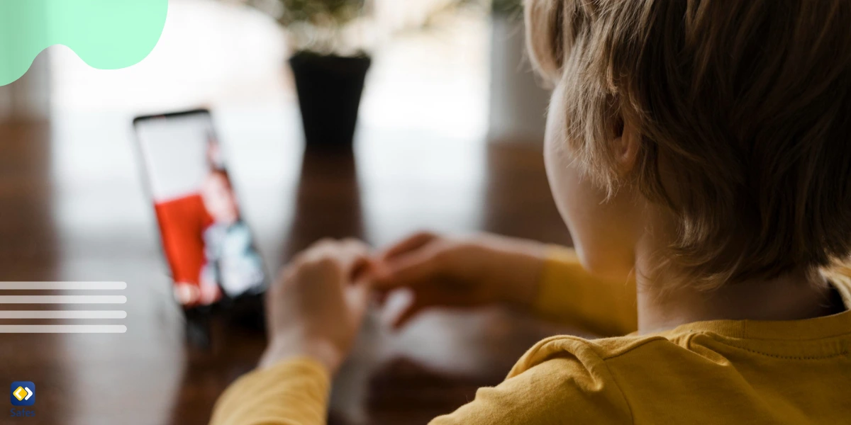 Child watching media on a his phone, highlighting the importance of learning how to turn off screen time without passcode for parents to protect their children from excessive screen time