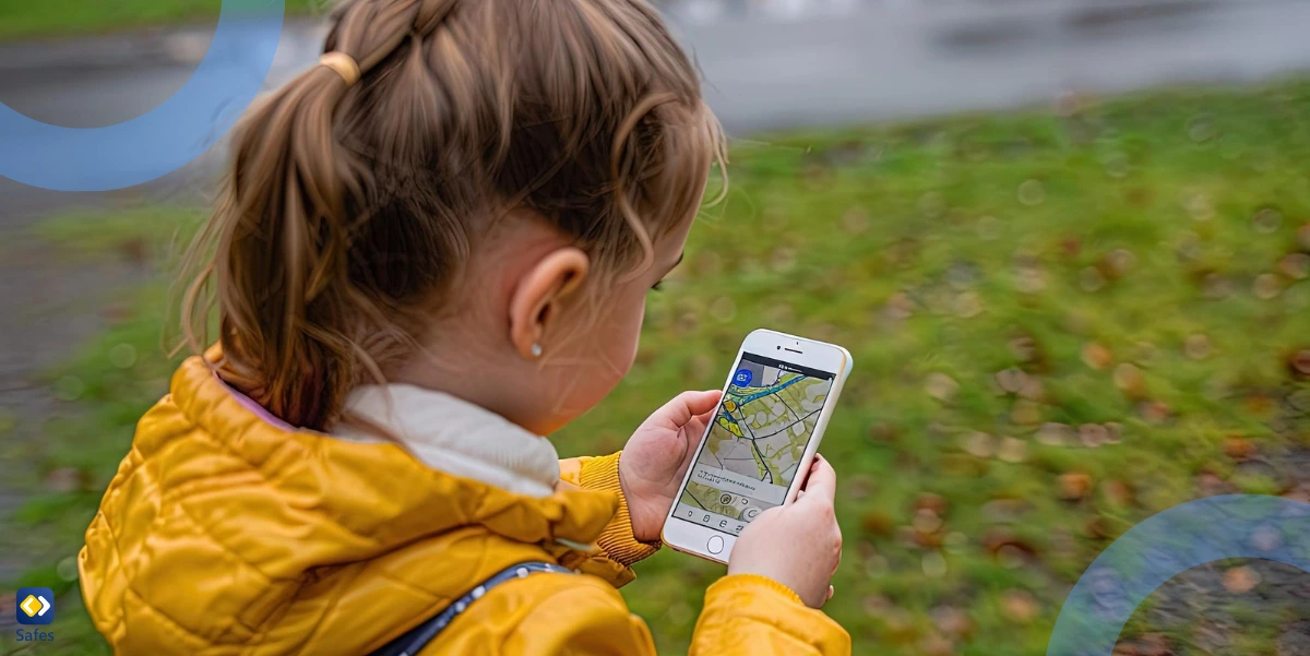 A little girl looking at a map on her phone and sharing location